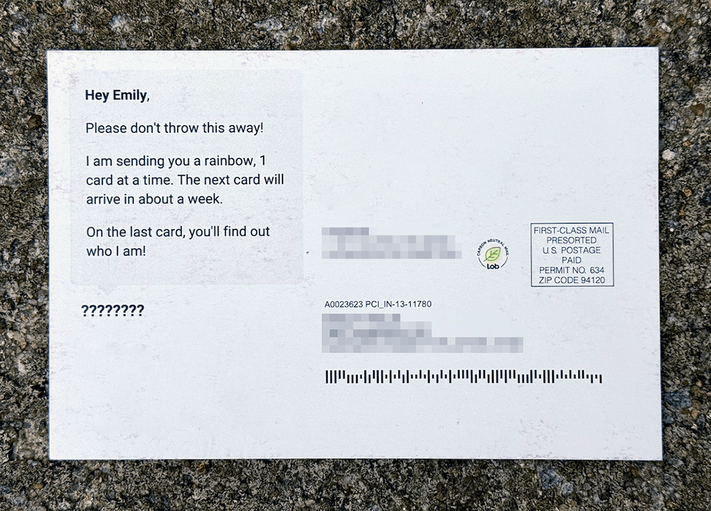 Example of the back of a Slow-Mo Rainbow postcard.