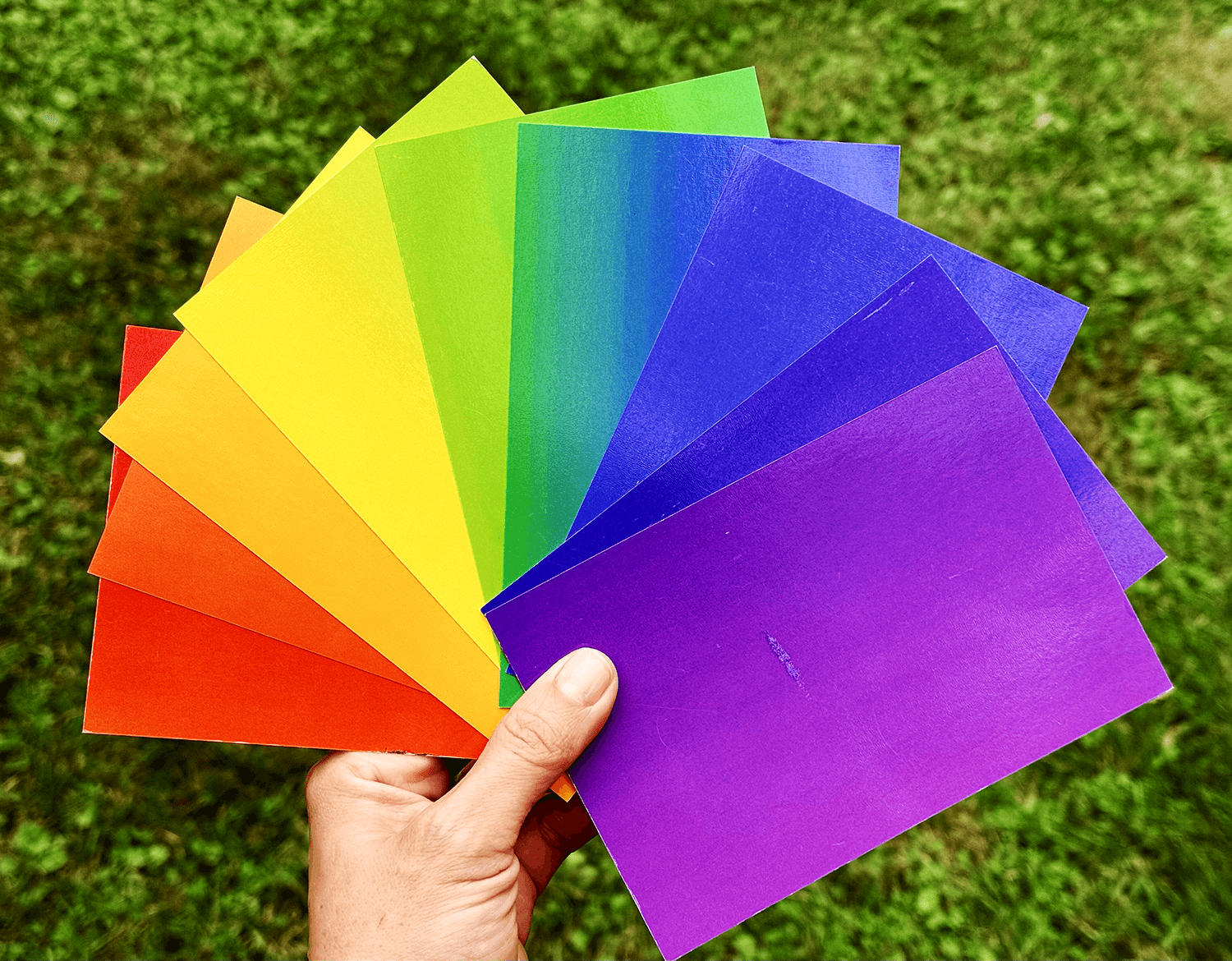 A Slow-Mo Rainbow of 9 postcards (sent one card per week).